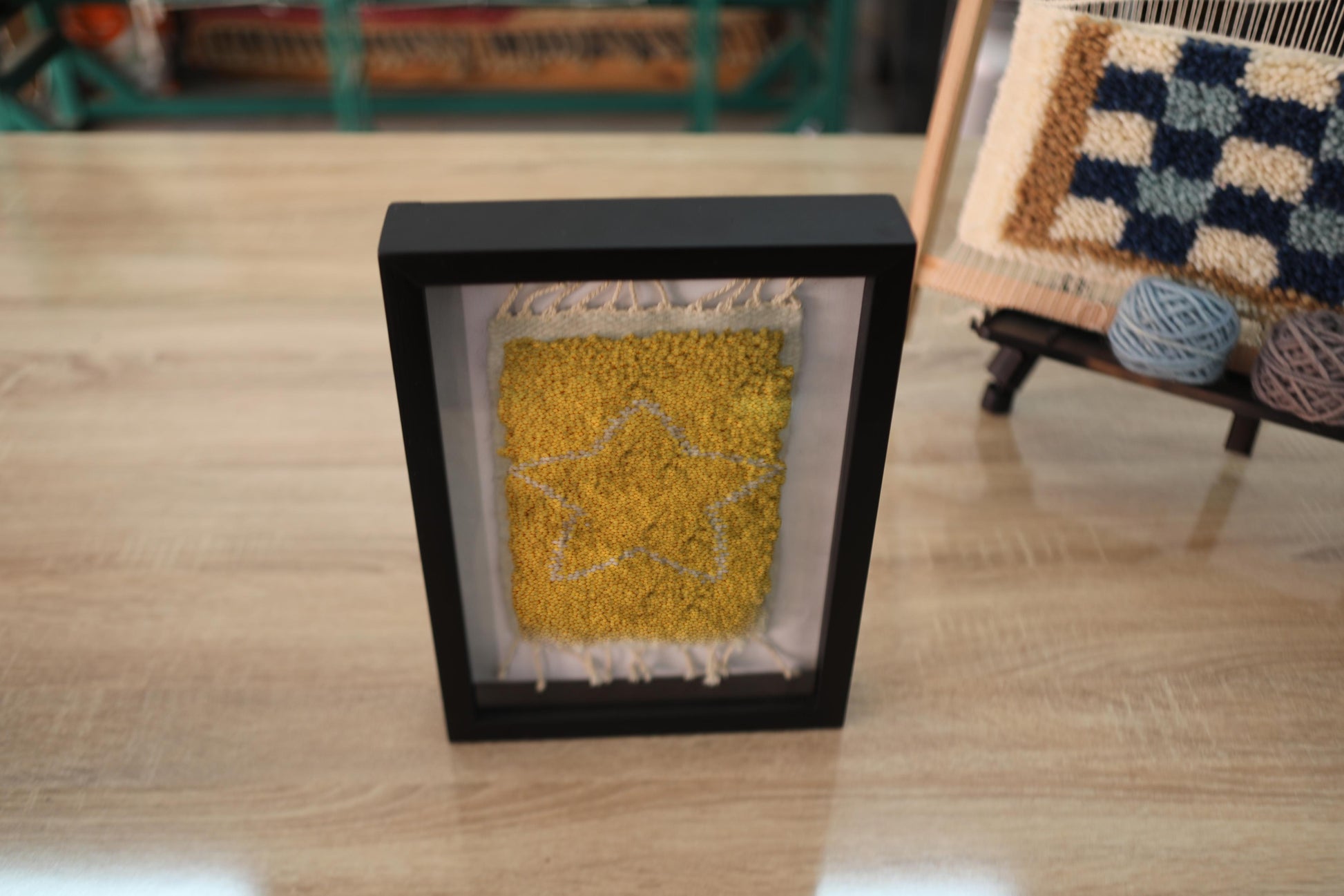 moroccan rug, yellow wool wall art, starburst rug, hand-knotted wool rug, boho framed tapestry, celestial decor, handmade rug wall hanging, knot by knot moroccan rug, modern moroccan textile, framed starburst wall piece, small rug tapestry, 25x31 cm
