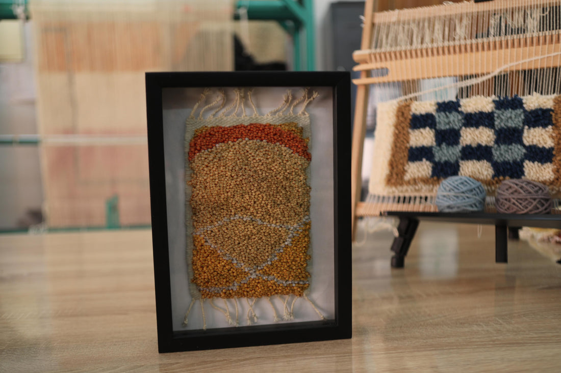moroccan rug wall art, abstract moroccan textile, hand knotted mini rug, framed earth tone rug, artisanal rug decor, knot by knot weaving, tribal rug design, moroccan craftsmanship, wool wall hanging, 25x31 cm rug art
