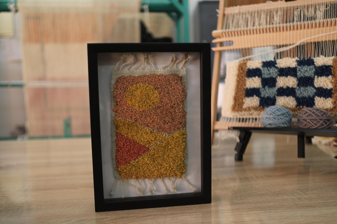 moroccan rug wall art, abstract sunset rug, hand knotted textile art, boho framed moroccan rug, orange yellow wall decor, knot by knot mini rug, artisan wool wall art, geometric moroccan design, framed wool tapestry, 25x31 cm handmade moroccan rug
