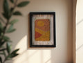 moroccan rug wall art, abstract sunset rug, hand knotted textile art, boho framed moroccan rug, orange yellow wall decor, knot by knot mini rug, artisan wool wall art, geometric moroccan design, framed wool tapestry, 25x31 cm handmade moroccan rug
