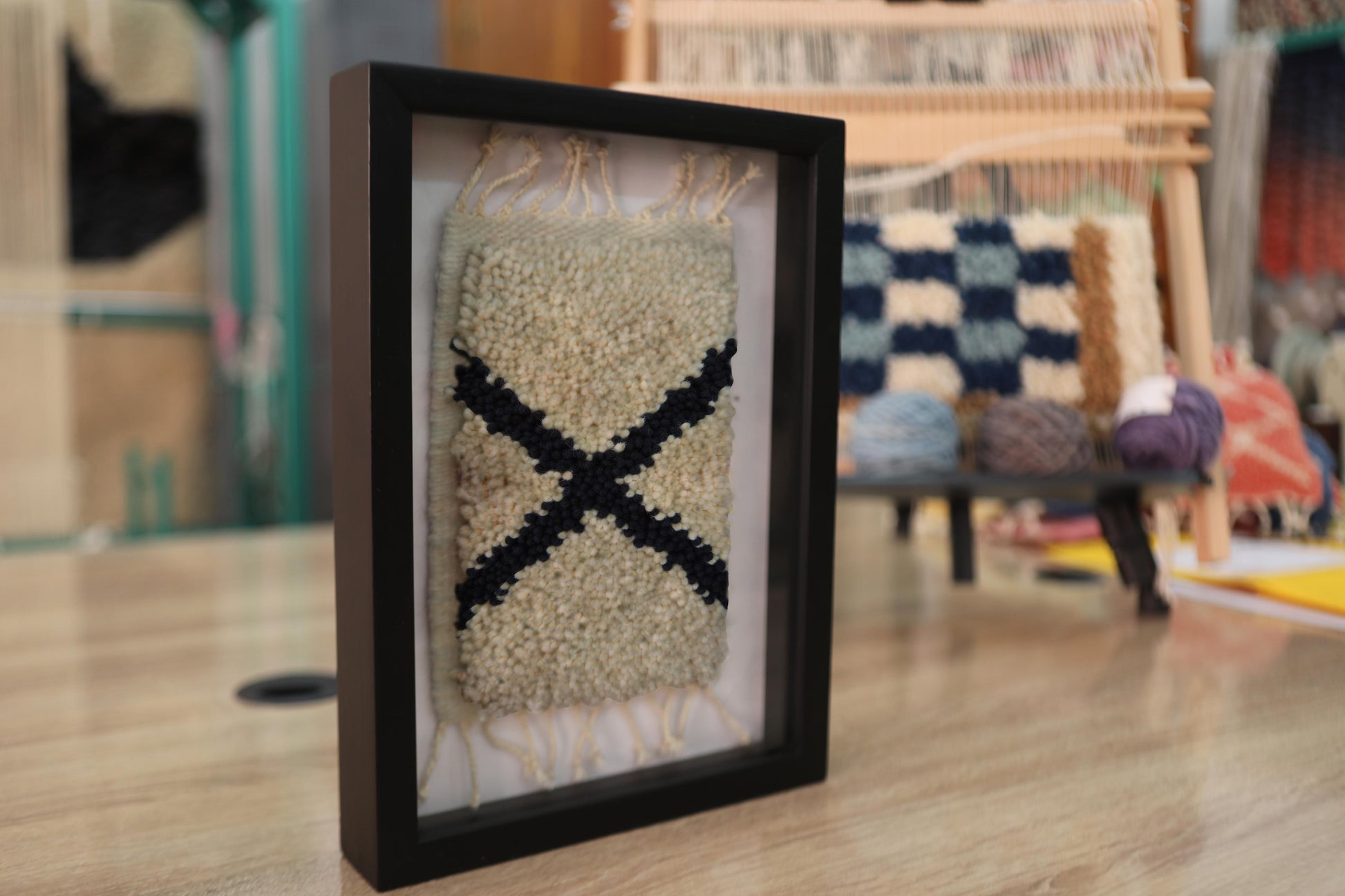 moroccan rug wall art, angled x rug, boho framed textile art, hand-knotted wall hanging, knot by knot moroccan rug, tribal wall decor, wool wall tapestry, small framed rug, bohemian decor piece, artisan rug wall art
