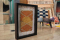 moroccan rug wall art, framed mini moroccan rug, hand knotted sun medallion textile, small framed wool rug, boho wall decor, mustard orange moroccan rug, knot by knot handmade rug, 25x31 cm moroccan tapestry, artisan moroccan wool art, desert sun rug decor
