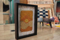 moroccan rug wall art, golden hour rug, abstract moroccan textile art, framed wool wall hanging, boho home decor, hand knotted rug artwork, knot by knot mini moroccan rug, warm toned wall art, 25x31 cm framed tapestry, artisan moroccan wool decor
