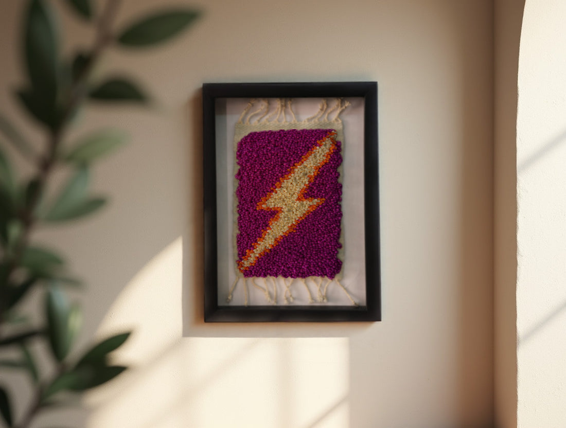 moroccan rug wall art, golden lightning bolt rug, purple pink wool tapestry, framed textile decor, hand-knotted rug art, knot by knot mini rug, lightning wall hanging
