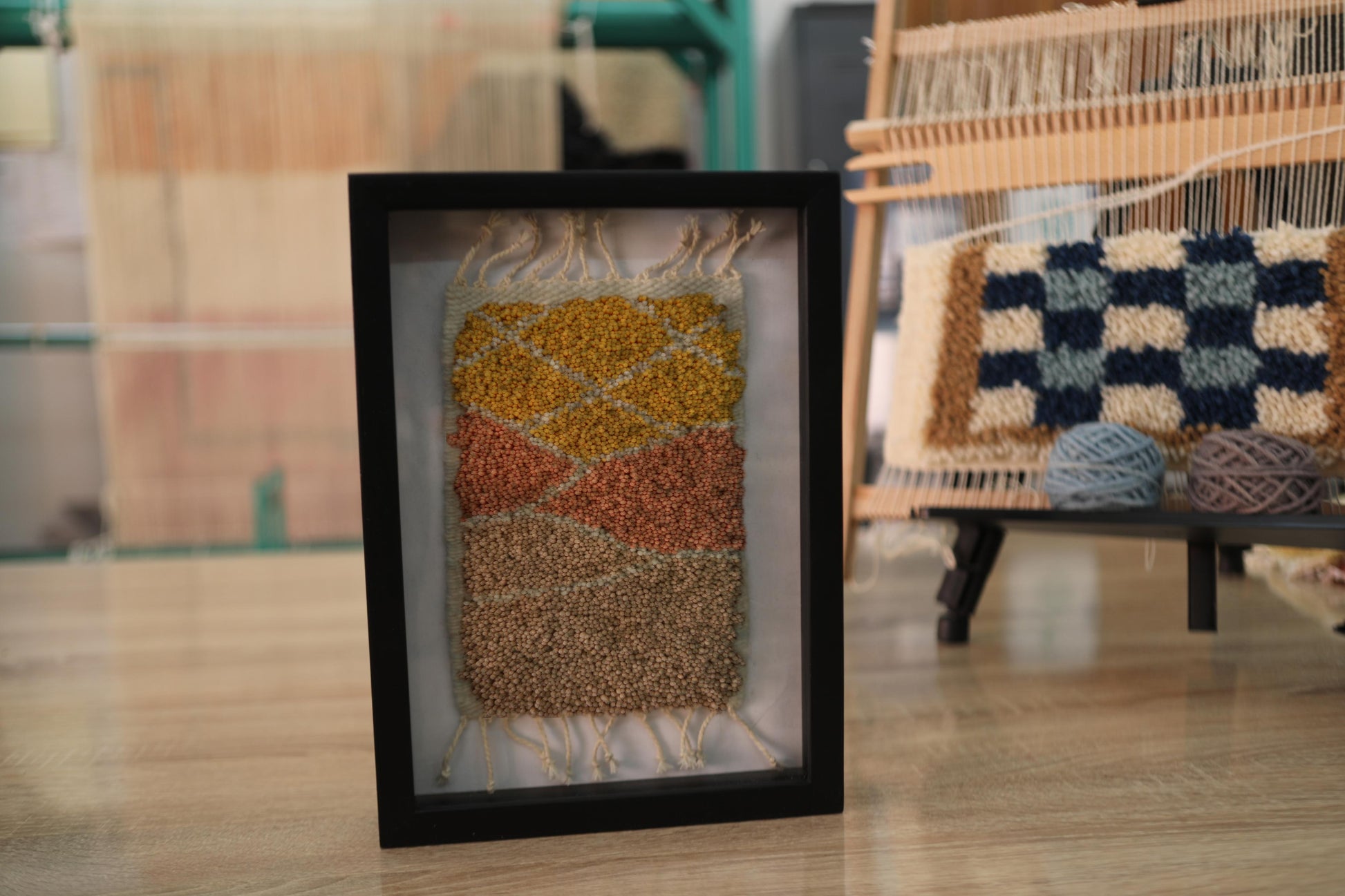 moroccan rug wall art, hand-knotted mini tapestry, framed moroccan wool rug, abstract landscape wall hanging, boho decor, artisan moroccan textile, knot by knot rug, geometric wool artwork, desert colors wall art, 25x31 cm moroccan tapestry