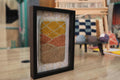 moroccan rug wall art, hand-knotted mini tapestry, framed moroccan wool rug, abstract landscape wall hanging, boho decor, artisan moroccan textile, knot by knot rug, geometric wool artwork, desert colors wall art, 25x31 cm moroccan tapestry