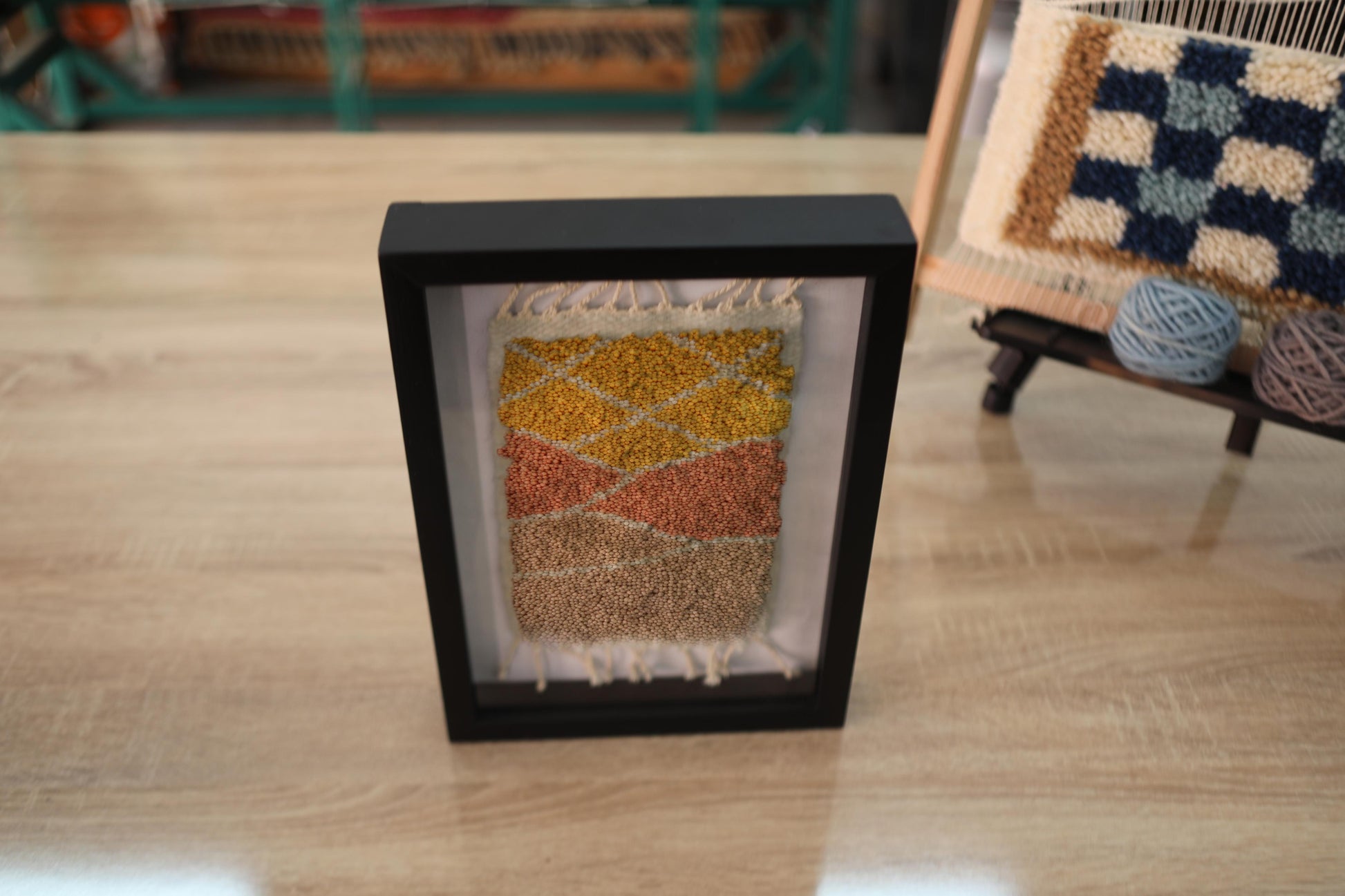 moroccan rug wall art, hand-knotted mini tapestry, framed moroccan wool rug, abstract landscape wall hanging, boho decor, artisan moroccan textile, knot by knot rug, geometric wool artwork, desert colors wall art, 25x31 cm moroccan tapestry