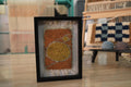 moroccan rug wall art, hand knotted moroccan rug, sun circle rug pattern, abstract moroccan textile, framed moroccan decor, boho wall hanging, yellow ochre rug art, knot by knot weaving, artisan moroccan wall decor, 25x31 cm
