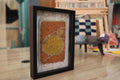 moroccan rug wall art, hand knotted moroccan rug, sun circle rug pattern, abstract moroccan textile, framed moroccan decor, boho wall hanging, yellow ochre rug art, knot by knot weaving, artisan moroccan wall decor, 25x31 cm

