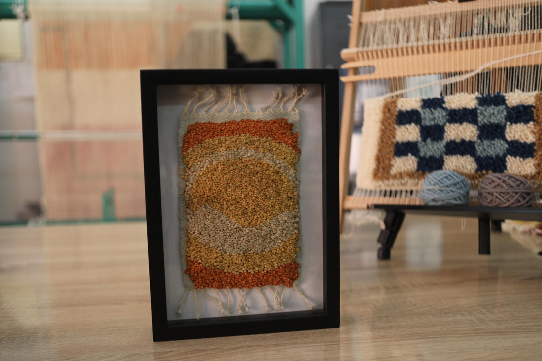 moroccan rug wall art, hand knotted sun rug, abstract moroccan rug, earth tone wall decor, framed wool rug, boho textile art, knot by knot weaving, artisan moroccan tapestry, warm toned rug art, 25x31 cm framed rug
