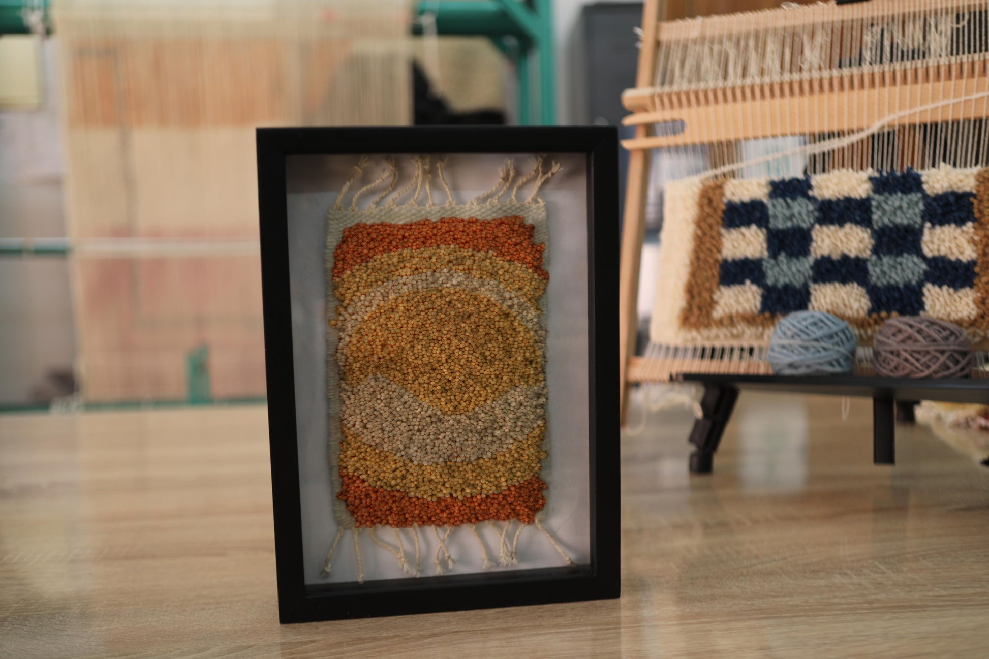 moroccan rug wall art, hand knotted sun rug, abstract moroccan rug, earth tone wall decor, framed wool rug, boho textile art, knot by knot weaving, artisan moroccan tapestry, warm toned rug art, 25x31 cm framed rug
