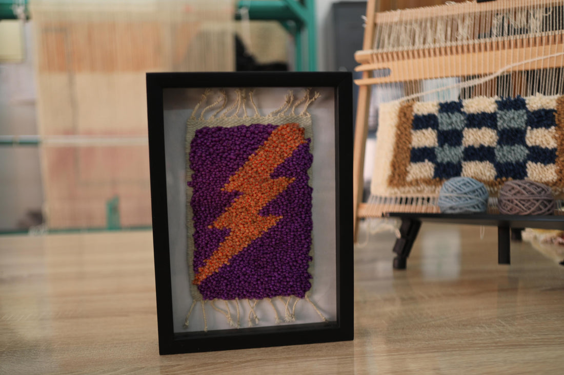 moroccan rug wall art, orange lightning bolt mini rug, framed textile art, purple wool wall hanging, hand-knotted tapestry, lightning bolt decor, knot by knot rug, moroccan handwoven mini rug
