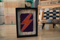 moroccan rug wall art, orange pink lightning bolt textile, framed wool mini rug, hand-knotted lightning decor, purple wool tapestry, lightning wall hanging, knot by knot rug, moroccan handmade tapestry
