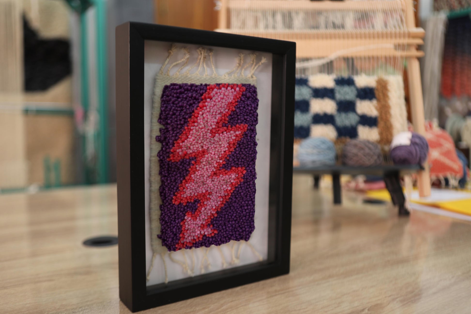 moroccan rug wall art, red pink lightning bolt textile, framed wool mini rug, hand-knotted purple tapestry, lightning decor art, knot by knot moroccan rug, small rug for wall, artisan lightning rug
