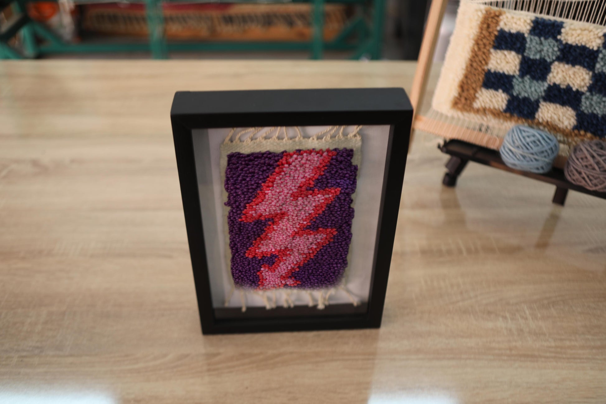 moroccan rug wall art, red pink lightning bolt textile, framed wool mini rug, hand-knotted purple tapestry, lightning decor art, knot by knot moroccan rug, small rug for wall, artisan lightning rug
