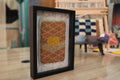 moroccan sunburst rug, hand-knotted mini rug, framed moroccan wall art, boho wall decor, sun motif textile, yellow sun moroccan rug, artisan woven wall piece, knot by knot wool rug, moroccan tapestry, framed rug 25x31 cm

