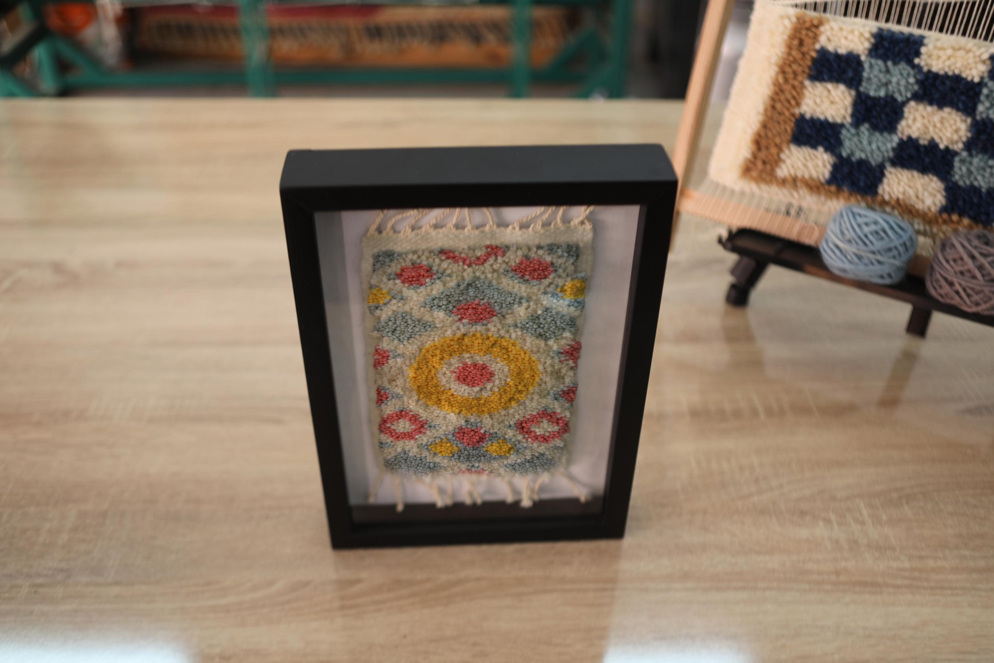 moroccan sunburst rug, hand-knotted wool wall hanging, mini framed rug decor, colorful boho textile art, knot by knot rug, sun rug moroccan design, 25x31 cm wall rug, artisan wool tapestry, handmade moroccan wall art
