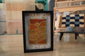 moroccan sunset rug, hand-knotted landscape rug, framed wool rug, boho sunset decor, moroccan rug wall art, knot by knot weaving, desert scene textile, artisan moroccan wall piece, mini sunset tapestry, framed rug 25x31 cm

