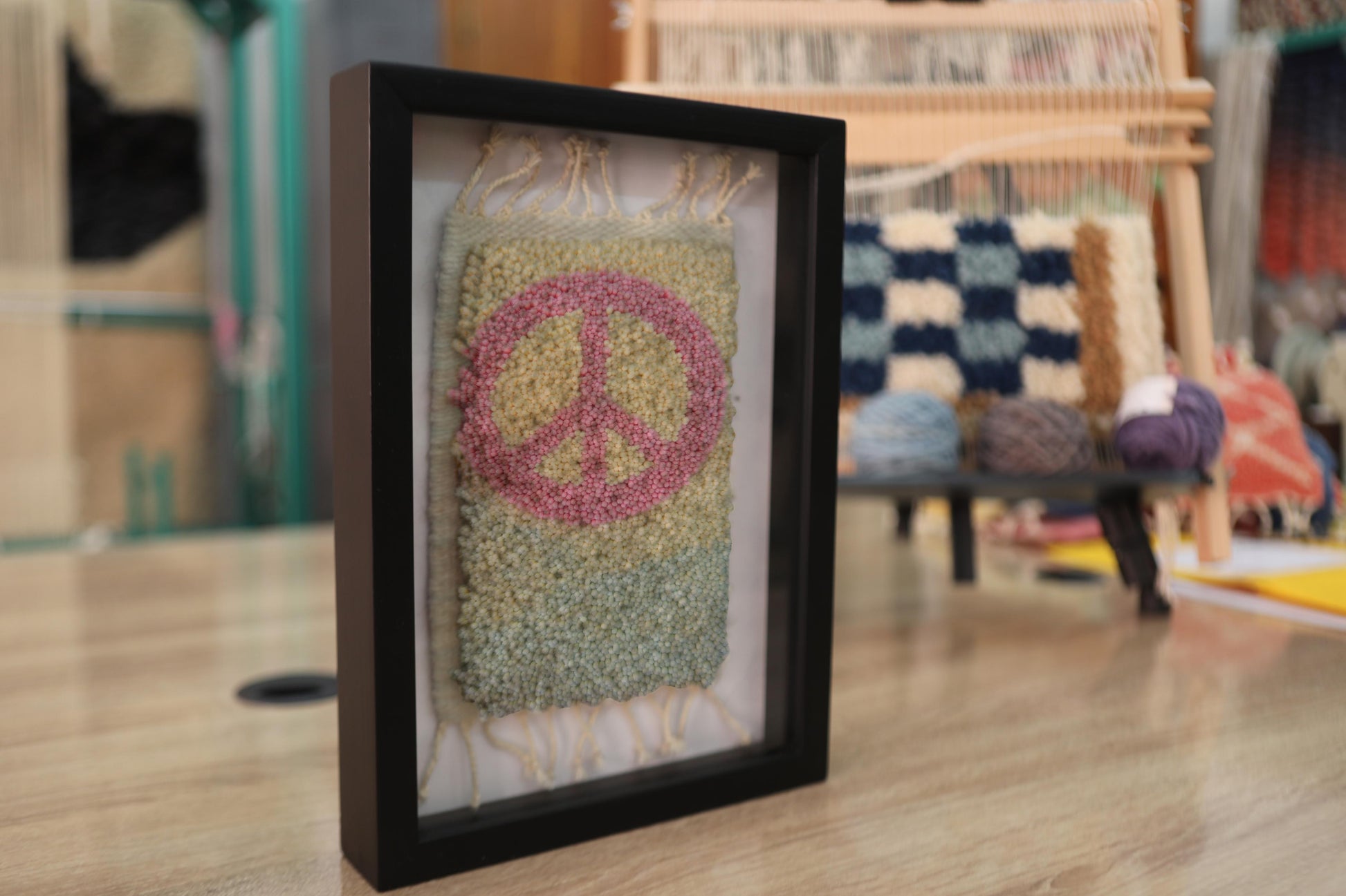 peace sign rug, moroccan rug, hand-knotted mini rug, framed rug art, wool wall hanging, boho decor, handmade rug art, knot by knot moroccan textile, peace wall art, 25x31 cm
