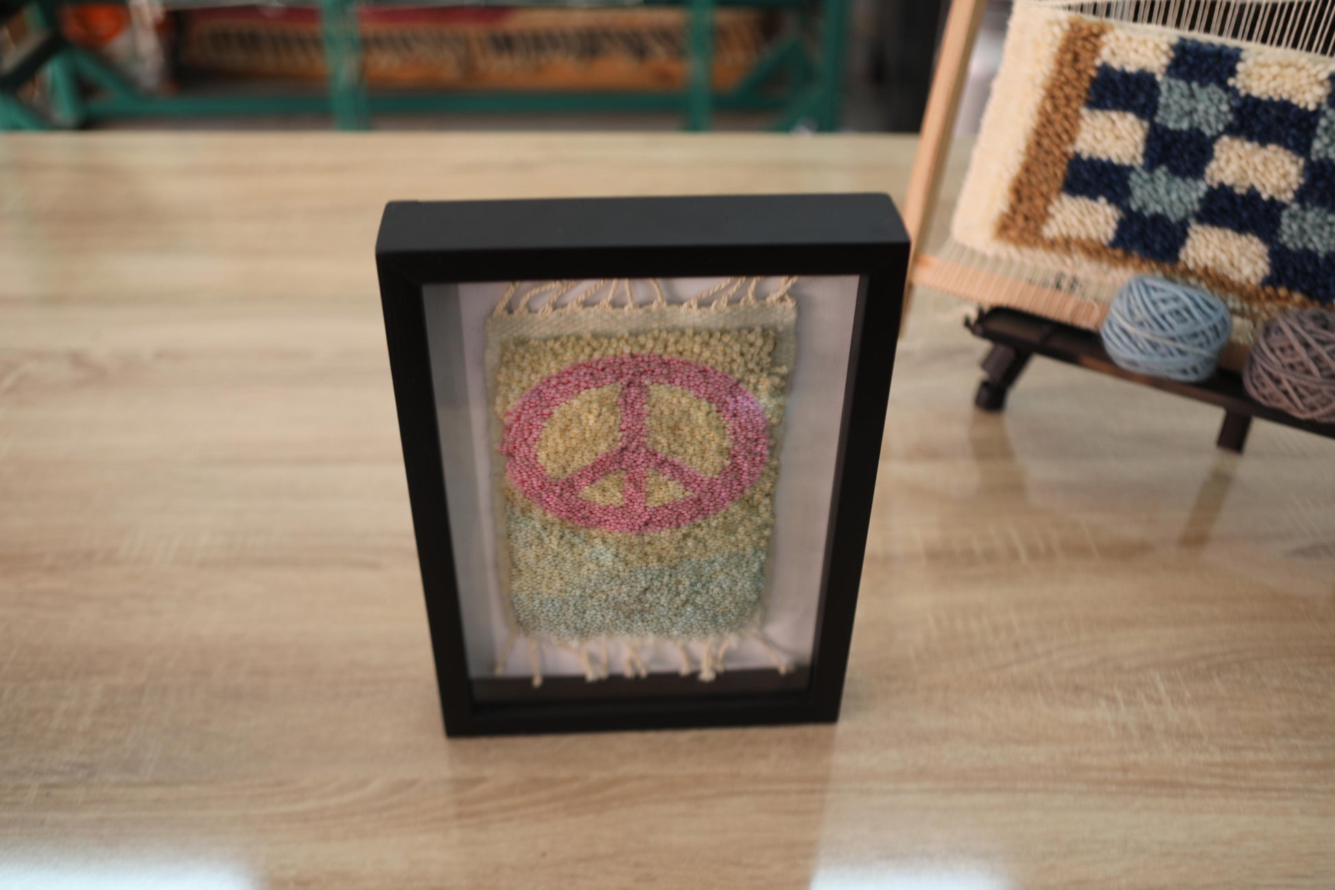peace sign rug, moroccan rug, hand-knotted mini rug, framed rug art, wool wall hanging, boho decor, handmade rug art, knot by knot moroccan textile, peace wall art, 25x31 cm
