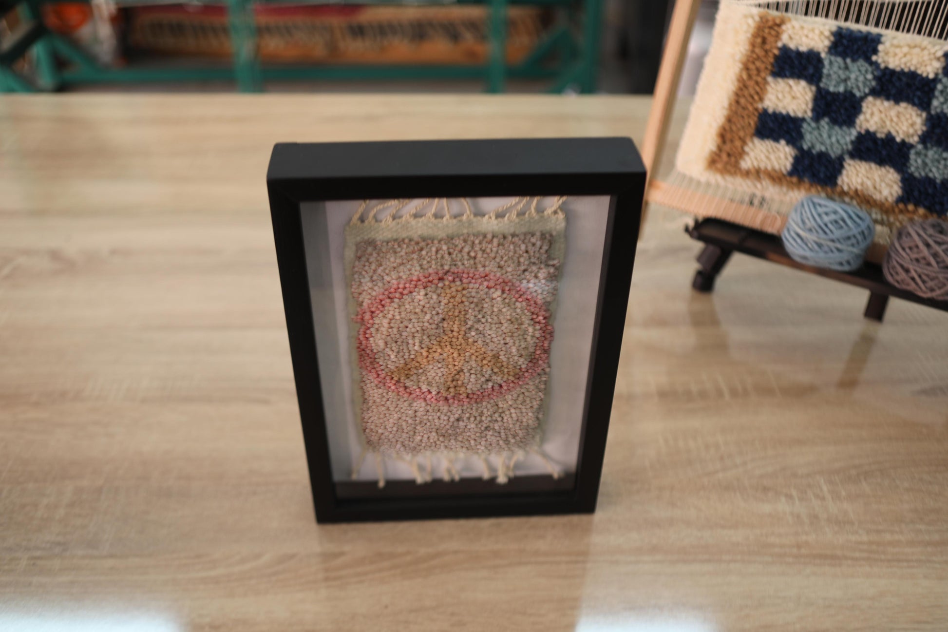 peace symbol rug, moroccan rug wall art, hand-knotted textile decor, wool peace wall hanging, boho mini tapestry, knot by knot rug, framed peace sign rug, moroccan handmade gift, 25x31 cm rug art
