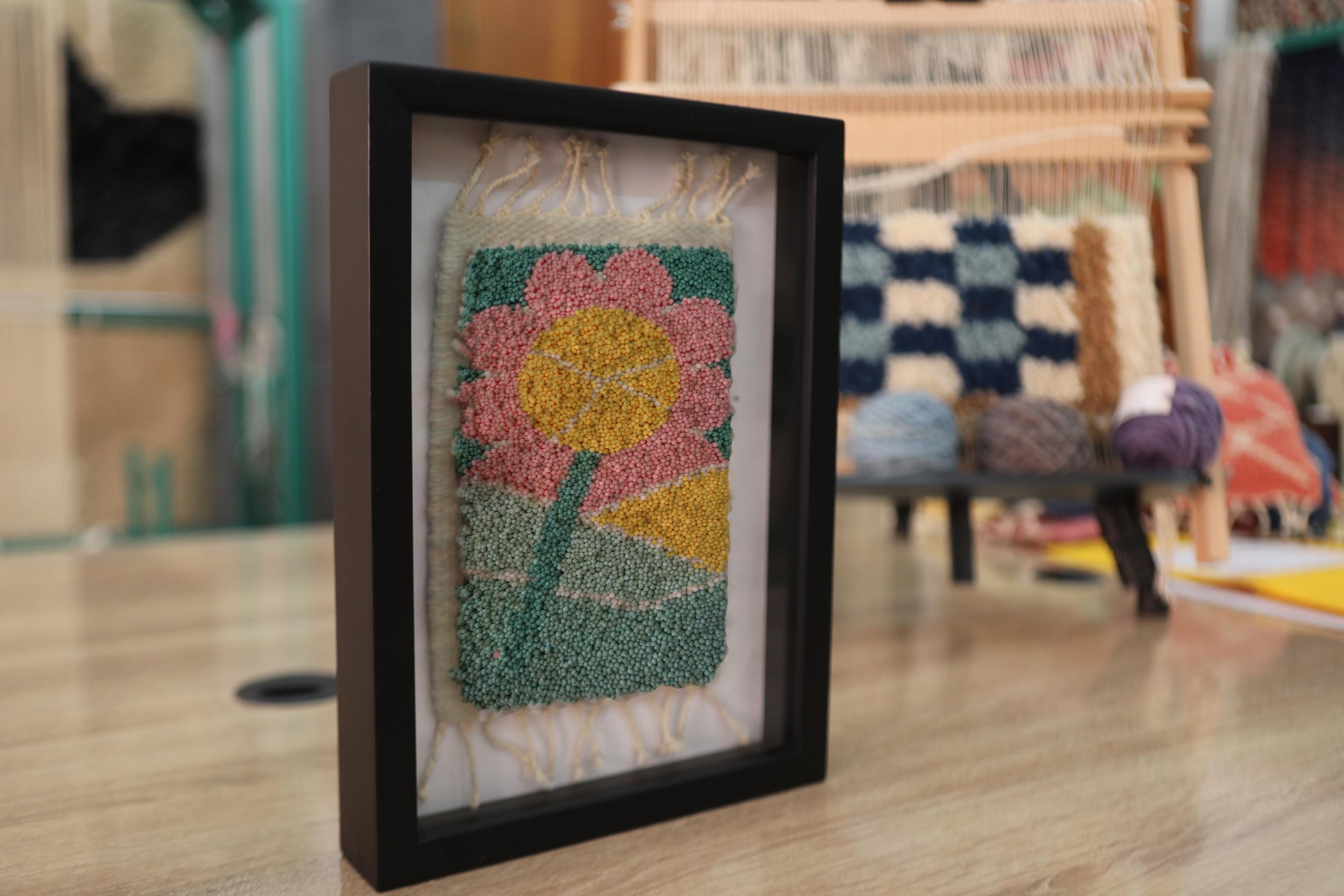 pink flower rug, moroccan rug wall art, hand-knotted wool textile, framed wool tapestry, retro floral rug decor, bohemian pink wall hanging, handmade moroccan mini rug, knot by knot rug, vintage flower wall art, 25x31 cm wool rug art
