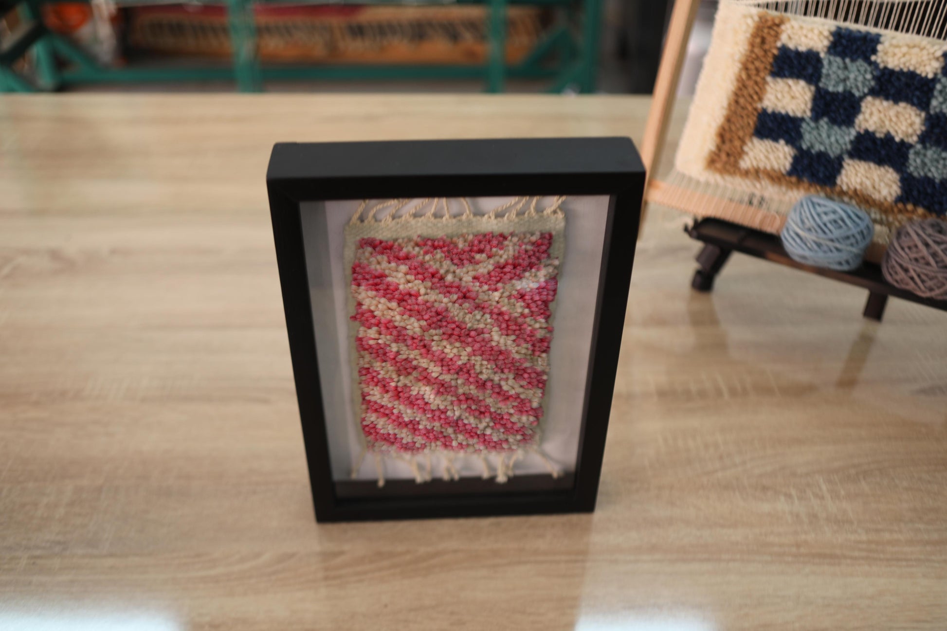 Add a burst of rhythm and softness to your space with this hand-knotted pink wave Moroccan rug wall art, crafted knot by knot in a 25x31 cm frame.

