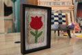 red rose moroccan rug, handmade rose wall art, wool floral tapestry, knot by knot moroccan rug, rose rug wall decor, bohemian textile art, artisan wool wall hanging, red rose mini rug, framed moroccan flower rug, 25x31 cm wall art
