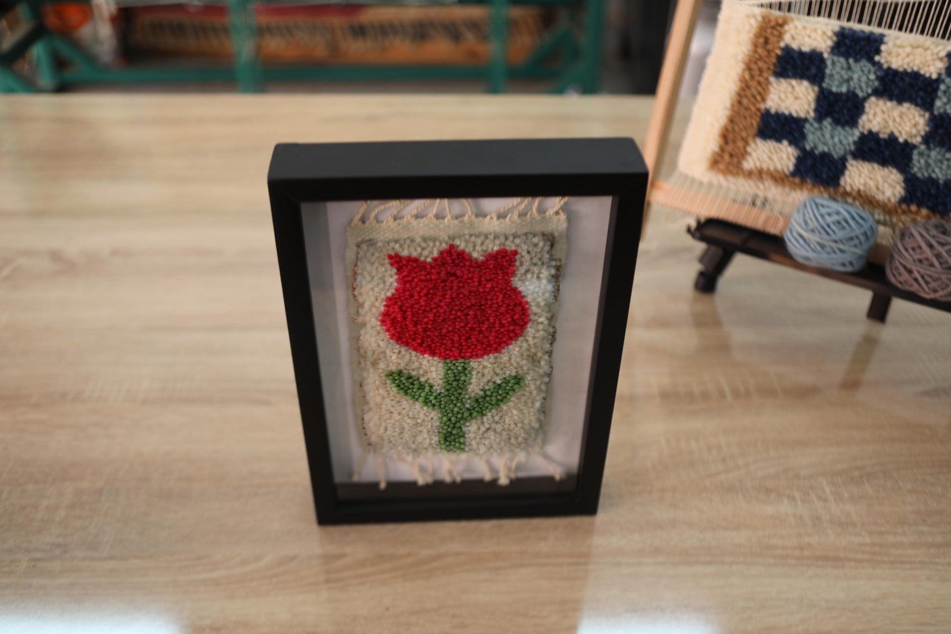 red rose moroccan rug, handmade rose wall art, wool floral tapestry, knot by knot moroccan rug, rose rug wall decor, bohemian textile art, artisan wool wall hanging, red rose mini rug, framed moroccan flower rug, 25x31 cm wall art
