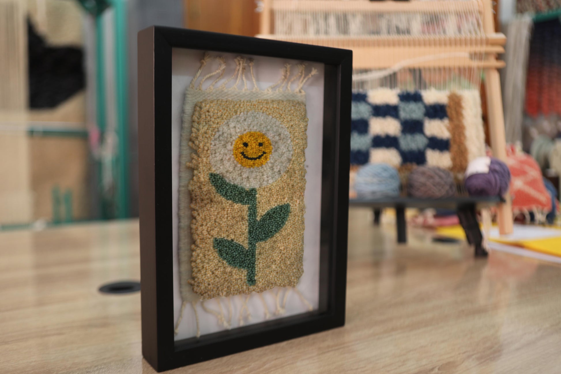 smiley flower rug, mini moroccan rug, hand-knotted wool art, cheerful wall textile, boho decor, framed flower rug, smiling face wool rug, 25x31 cm moroccan rug, kids room decor, handmade moroccan textile
