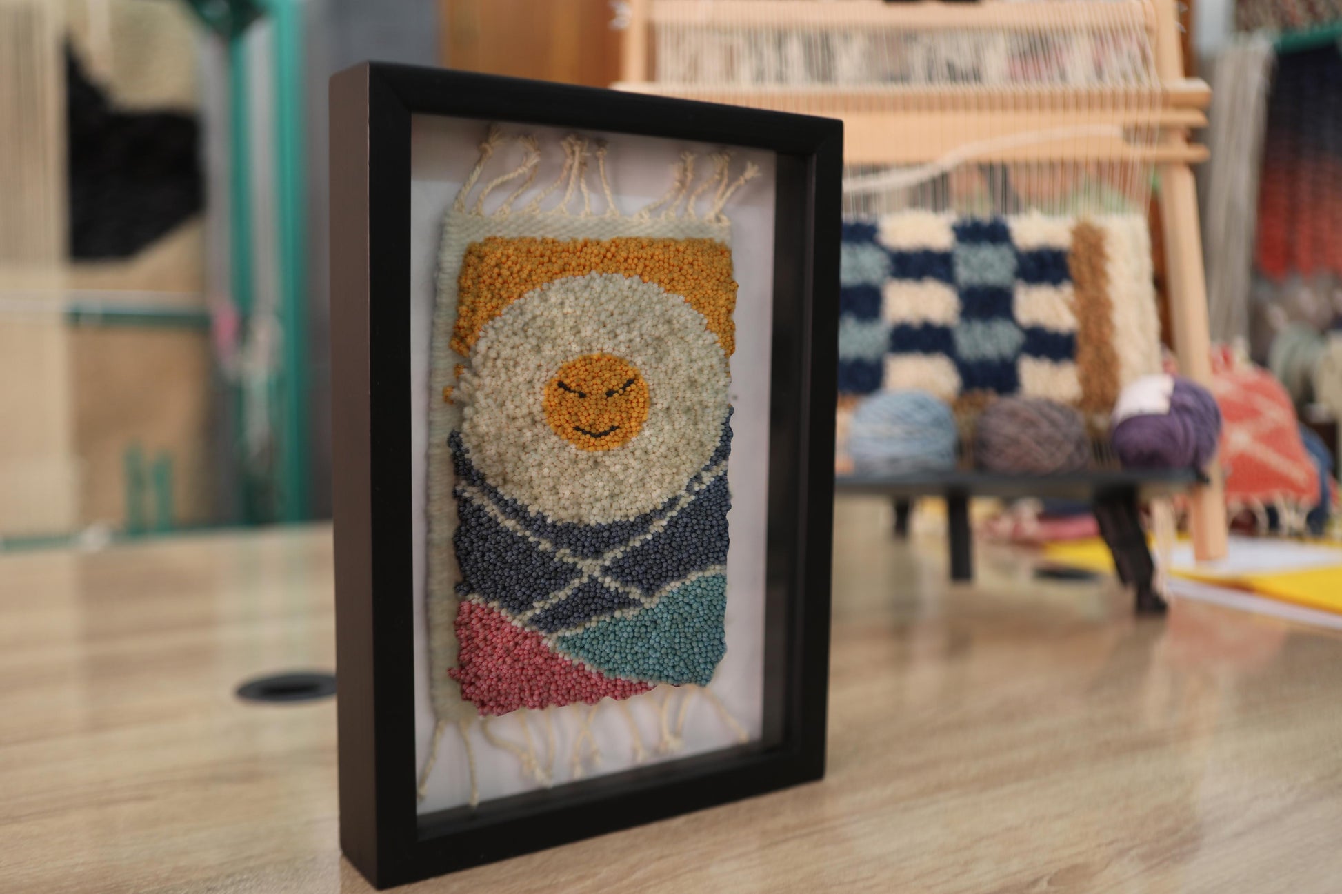 smiling sun rug, happy sun moroccan rug, mini wall decor, hand-knotted moroccan textile, sunrise wool art, colorful sun wall rug, boho home decor, framed wool rug, knot by knot rug art, 25x31 cm moroccan rug wall hanging
