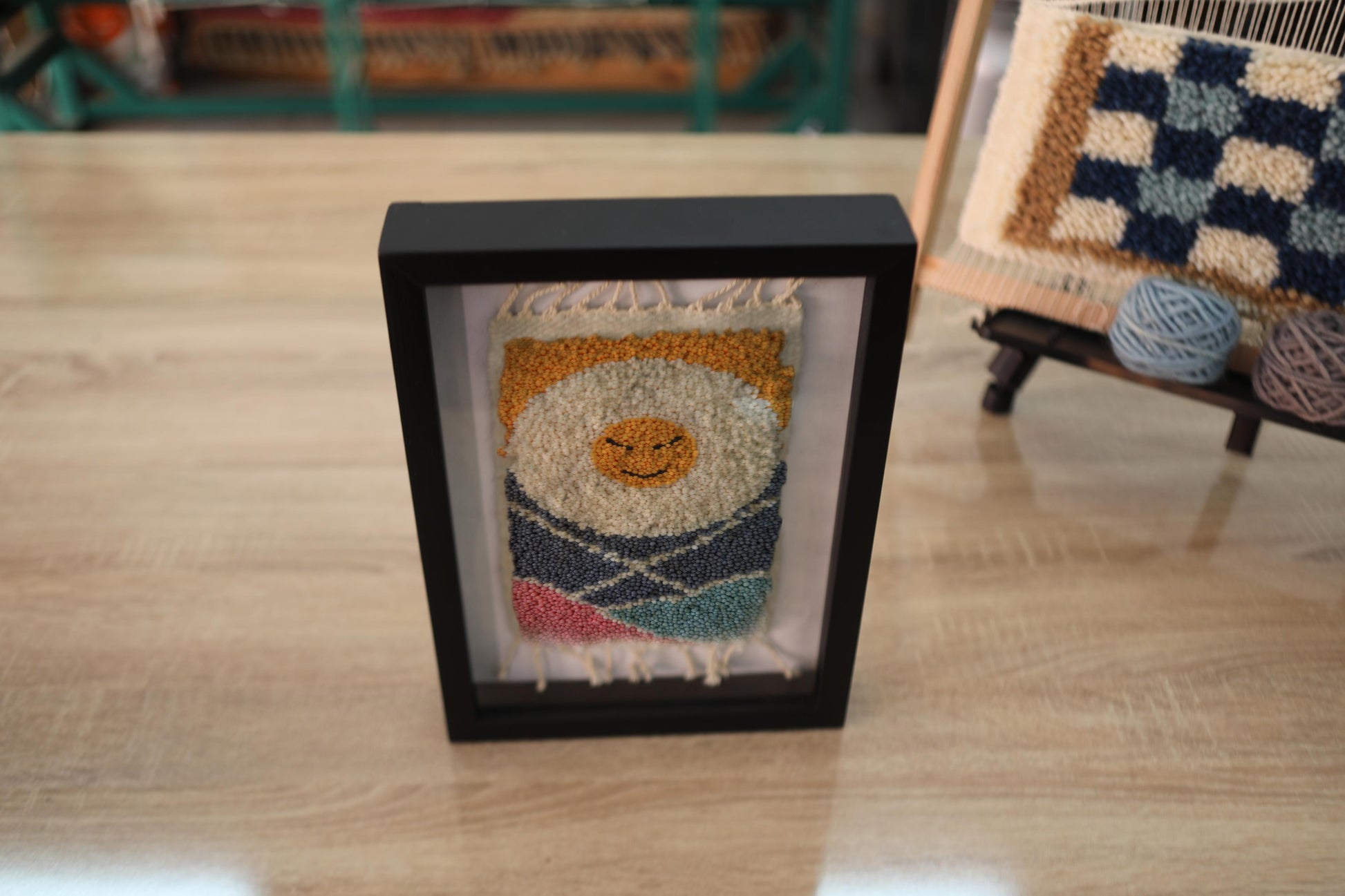 smiling sun rug, happy sun moroccan rug, mini wall decor, hand-knotted moroccan textile, sunrise wool art, colorful sun wall rug, boho home decor, framed wool rug, knot by knot rug art, 25x31 cm moroccan rug wall hanging
