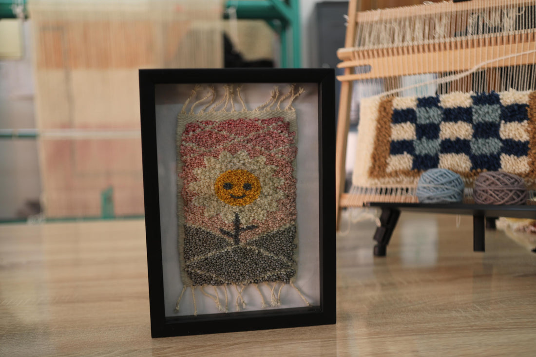 sunflower mini rug, hand-knotted moroccan rug, smiling flower wall art, moroccan wall decor, sunset textile art, mini wool rug, framed rug artwork, boho home decor, moroccan rug flower, knot by knot weaving, 25x31 cm handmade rug
