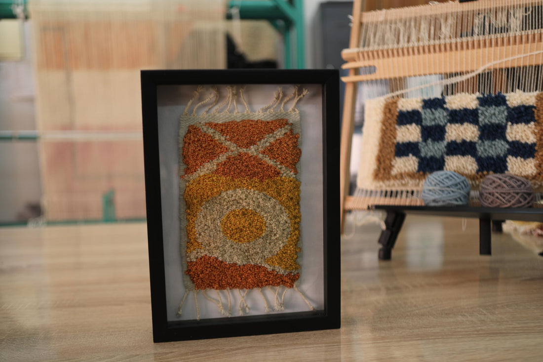 sun motif moroccan rug, framed moroccan wall art, hand-knotted wool rug, small moroccan rug artwork, knot by knot rug, bohemian wall decor, moroccan textile art, orange and yellow mini rug, 25x31 cm rug wall hanging, artisan moroccan wool tapestry
