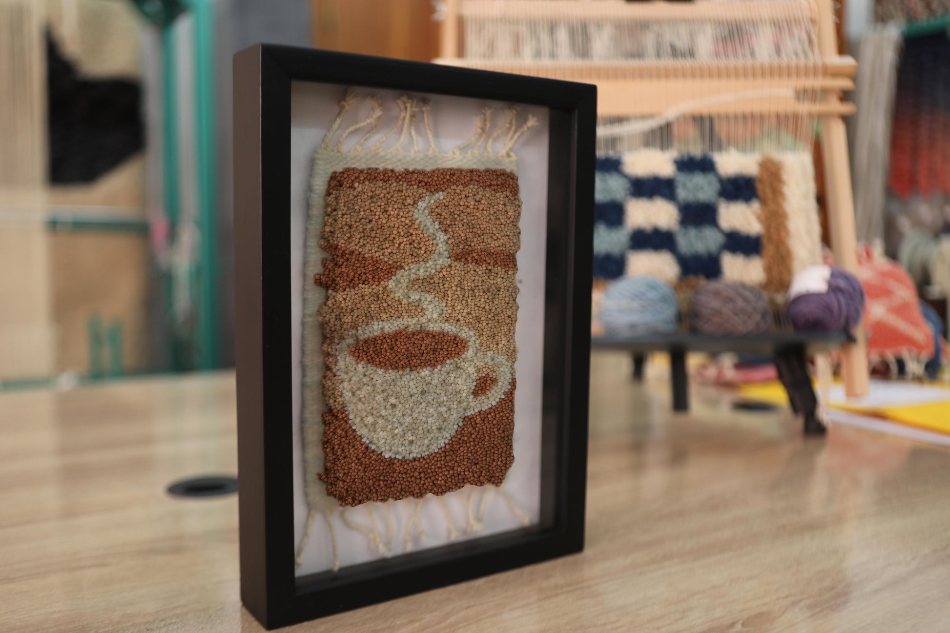 sunrise coffee wall art, moroccan rug, hand knotted textile art, framed wool mug decor, boho kitchen wall hanging, knot by knot rug, artisan coffee rug, handmade wool frame, 25x31 cm, morning coffee decor
