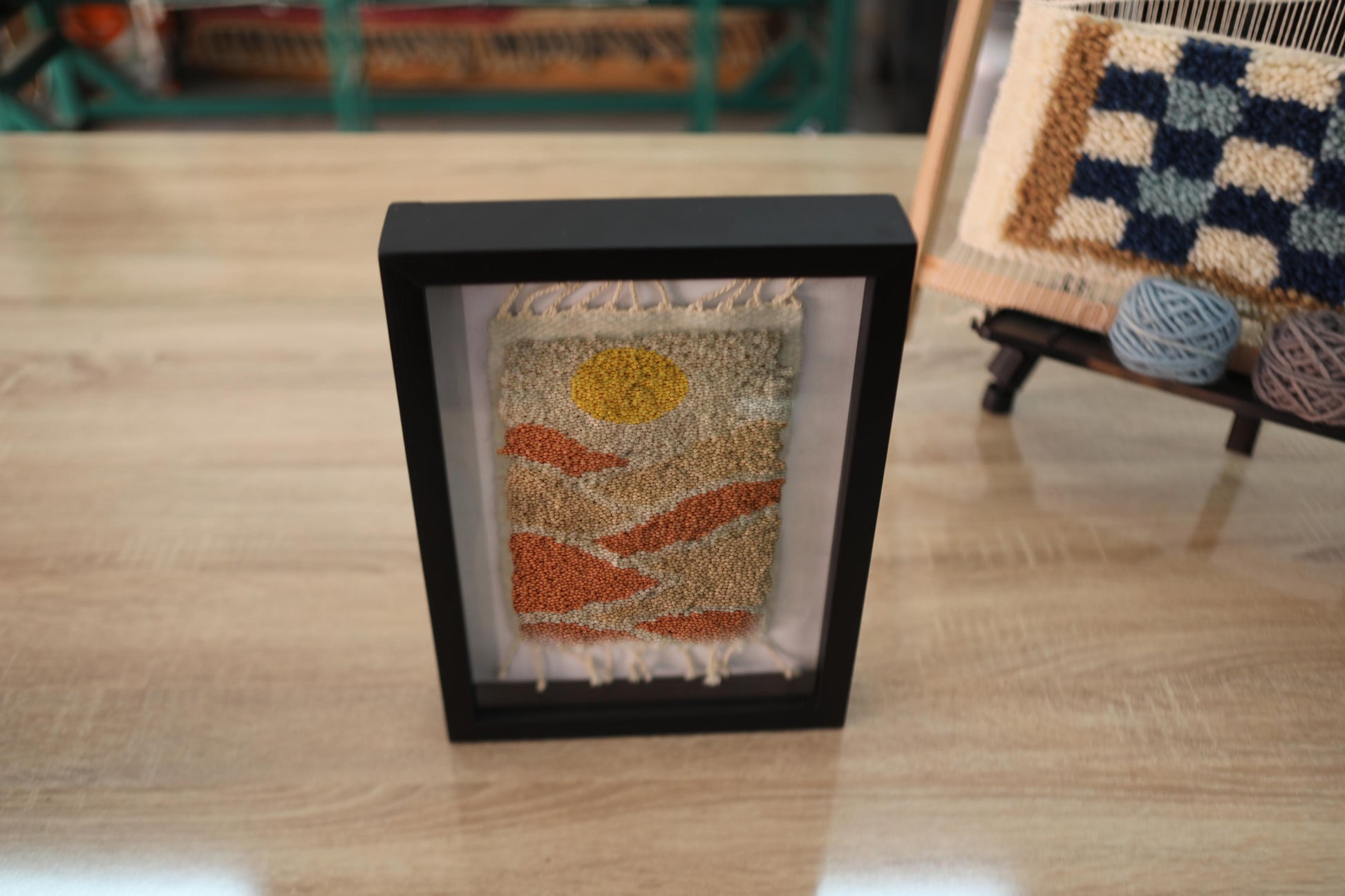 sunset dunes moroccan rug, framed moroccan textile art, handmade knot by knot rug, moroccan wall hanging, mini wool rug 25x31 cm, desert art moroccan rug, orange beige rug, artisan rug decor, boho framed weaving, contemporary moroccan craft
