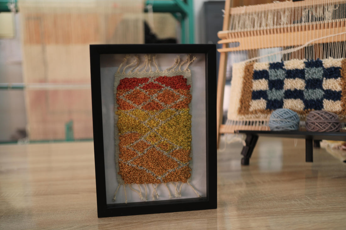 sunset moroccan rug, framed moroccan wall art, diamond moroccan tapestry, boho home decor, hand knotted mini rug, warm color moroccan textile, knot by knot wool art, moroccan rug 25x31 cm, artisanal wool wall hanging, orange yellow red rug art
