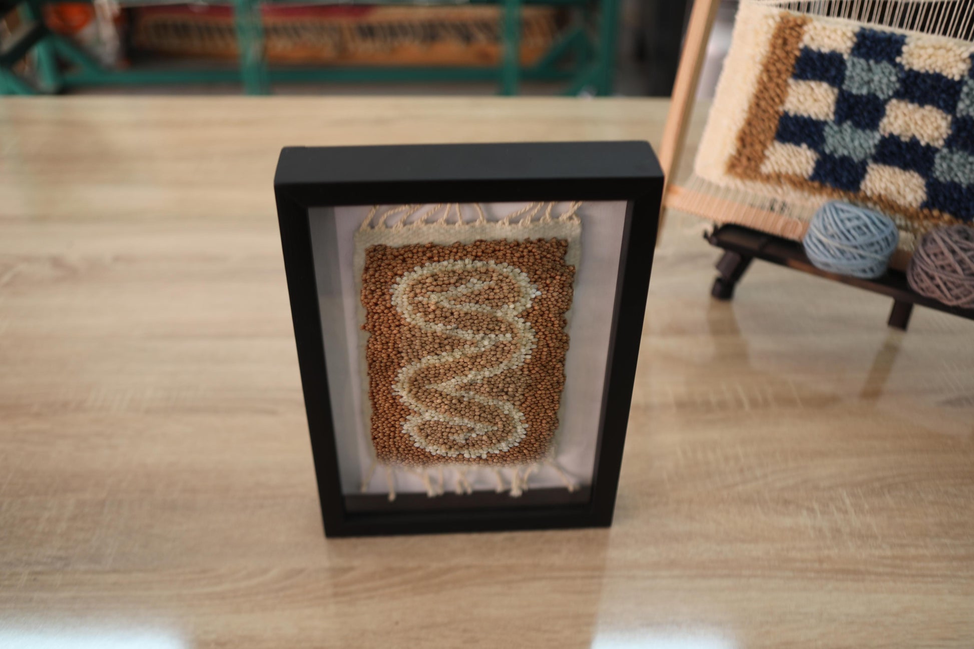 wavy rug wall art, moroccan mini rug, hand-knotted tapestry, framed wool wall decor, neutral home art, knot by knot moroccan rug, small boho wall hanging, abstract textile art
