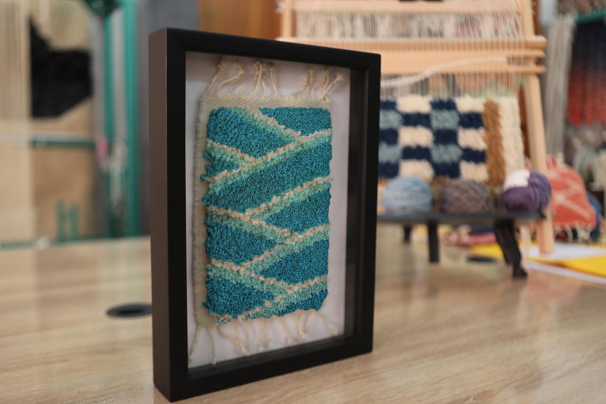 zigzag pattern, moroccan rug, blue and beige wall art, framed mini rug, hand-knotted wool, moroccan textile decor, artisan wall hanging, small rug art, knot by knot, geometric moroccan rug

