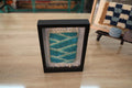 zigzag pattern, moroccan rug, blue and beige wall art, framed mini rug, hand-knotted wool, moroccan textile decor, artisan wall hanging, small rug art, knot by knot, geometric moroccan rug
