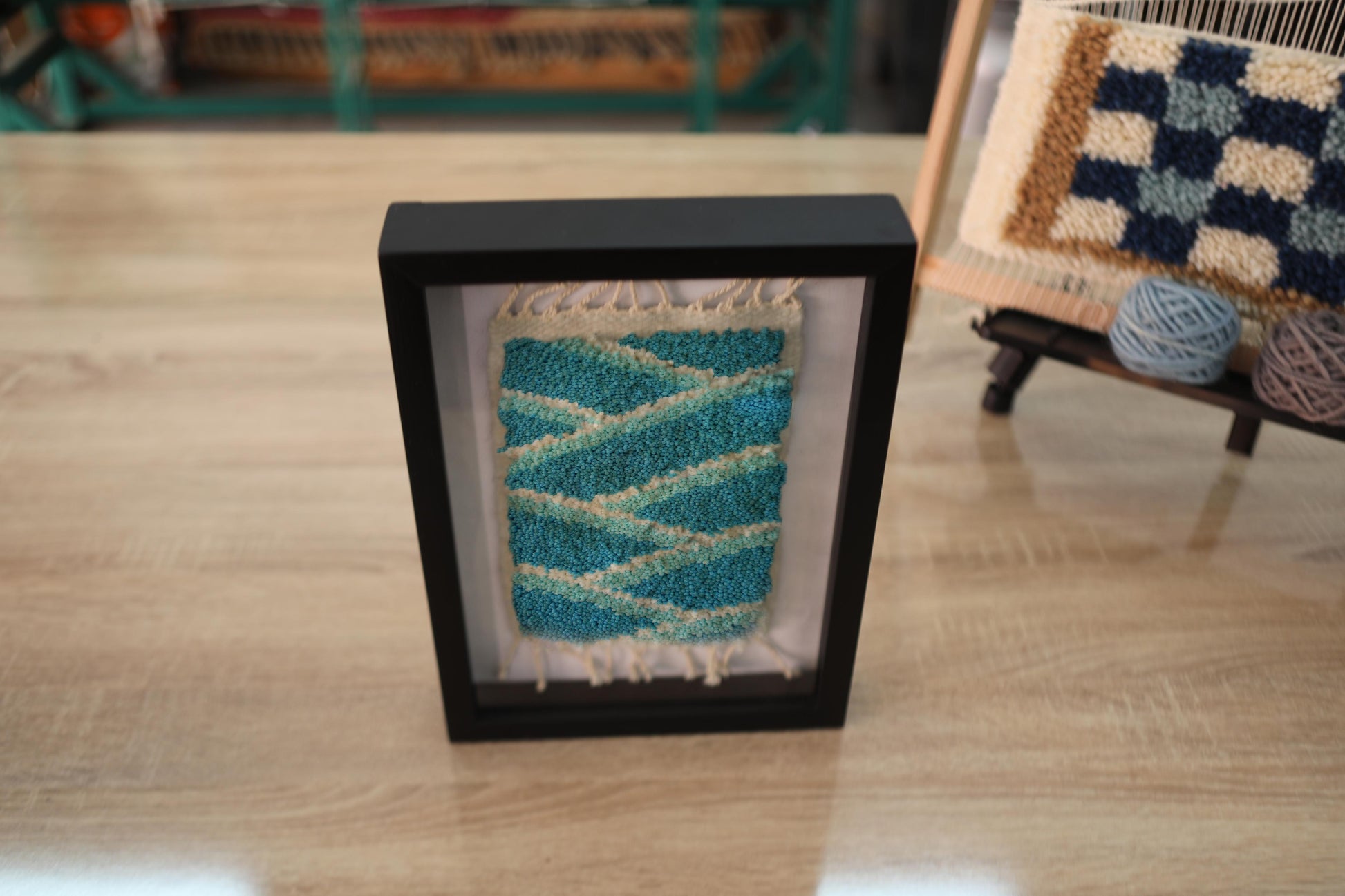 zigzag pattern, moroccan rug, blue and beige wall art, framed mini rug, hand-knotted wool, moroccan textile decor, artisan wall hanging, small rug art, knot by knot, geometric moroccan rug
